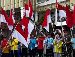 Pemda Balut Canangkan Gerakan 10 Ribu Bendera pada Pelepasan 52 Peserta Gerak Jalan